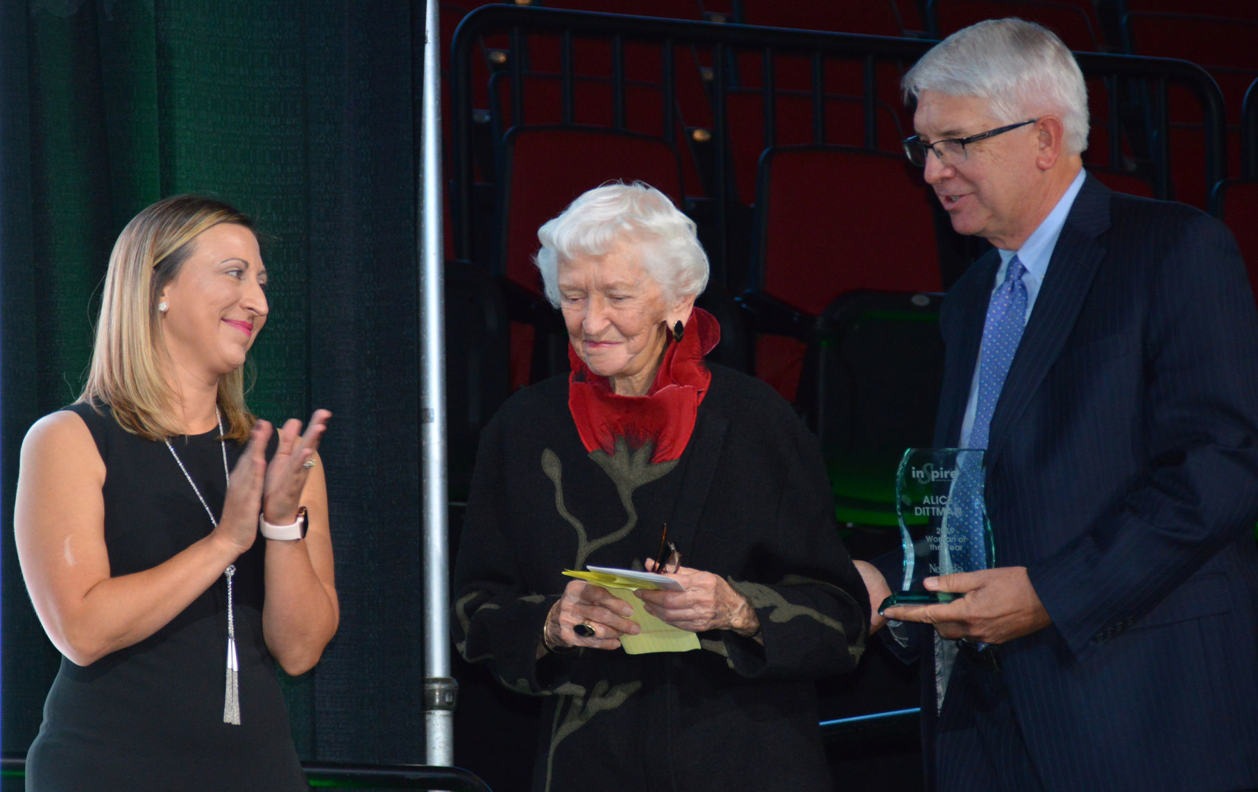 Natalia Wiita applauds Alice Dittman with son John Dittman